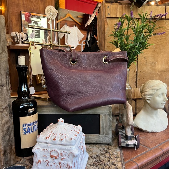 Purple Dooney & Bourke